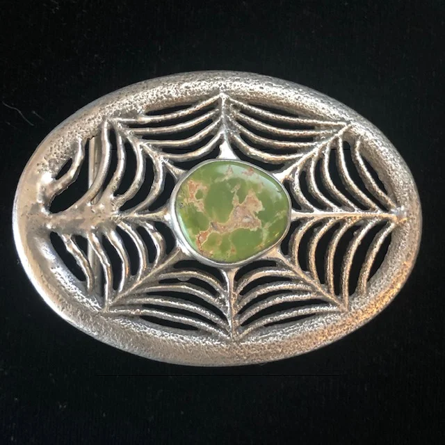 Spider web belt outlet buckle